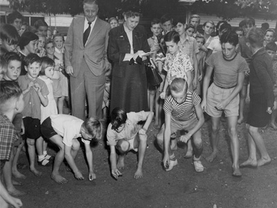 Children playing with marbles